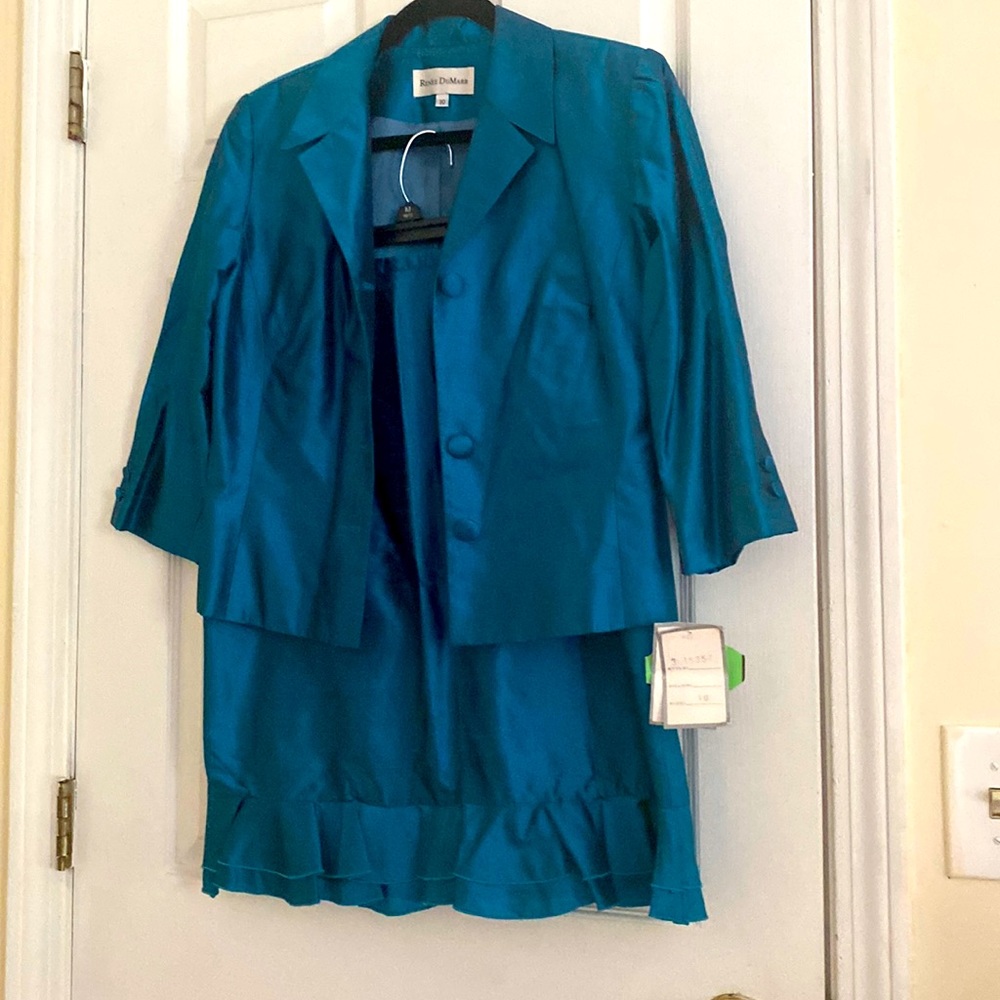 New metallic green-blue skirt suit with tag.